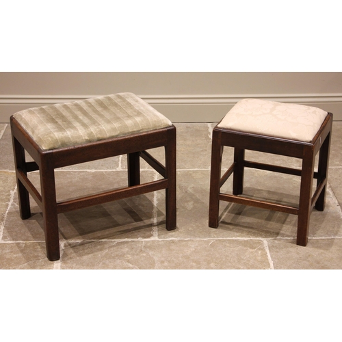 761 - A George III mahogany dressing stool, the upholstered drop-in seat, upon chamfered supports united b... 