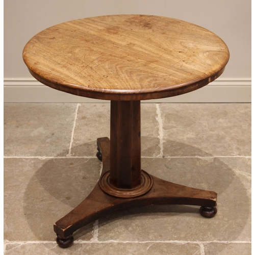 775 - A 19th century mahogany pedestal table, the circular top upon a tapering octagonal pedestal, tri-for... 