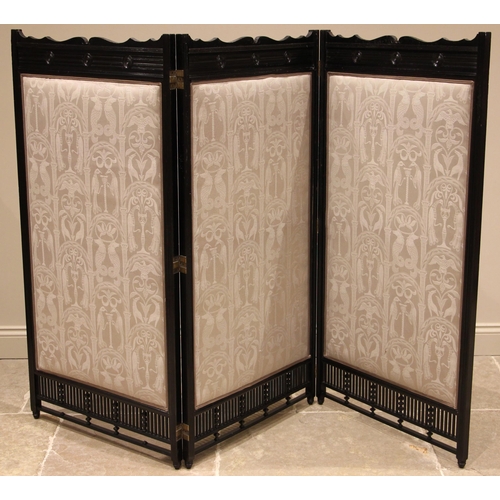 780 - A late 19th century ebonised Aesthetic Movement room screen, each of the three panels with a wavy pe... 