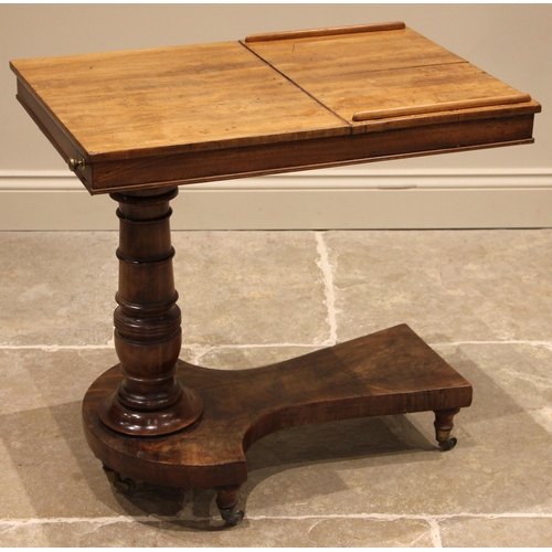 786 - A Victorian mahogany reading or duet music table, the rectangular top with two opposing easel slopes... 