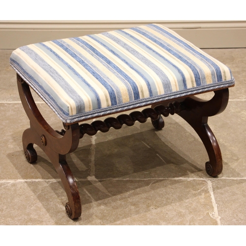 787 - A Victorian mahogany 'X' frame stool, the upholstered seat later re-covered with striped fabric, upo... 