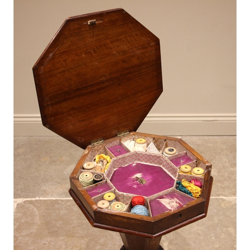 798 - A Victorian walnut and burr walnut sewing table, of tapering octagonal form, the burr cover opening ... 