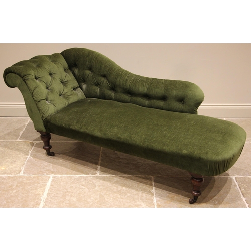 800 - A Victorian mahogany chaise longue, upholstered in green velour, the shaped button back extending to... 