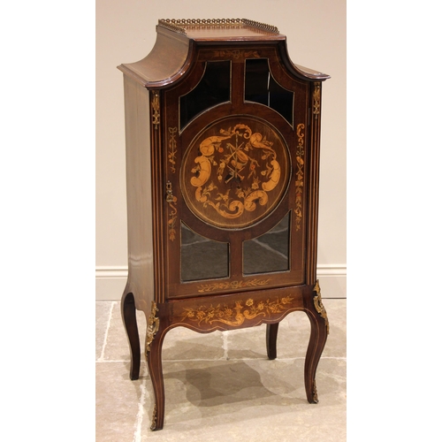 801 - A French Louis XV style inlaid mahogany display cabinet, late 19th century, the pagoda shaped top wi... 