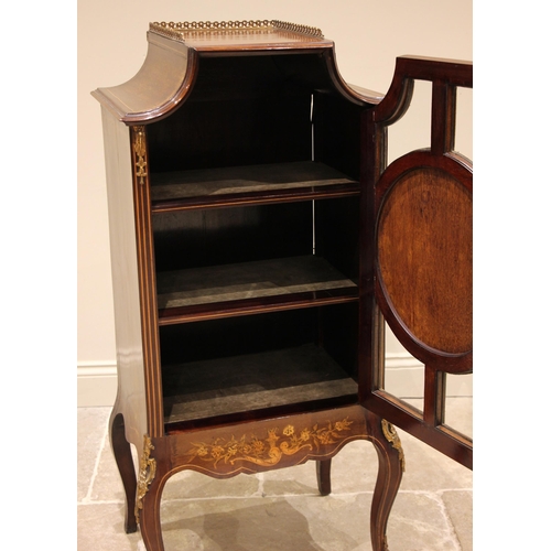 801 - A French Louis XV style inlaid mahogany display cabinet, late 19th century, the pagoda shaped top wi... 