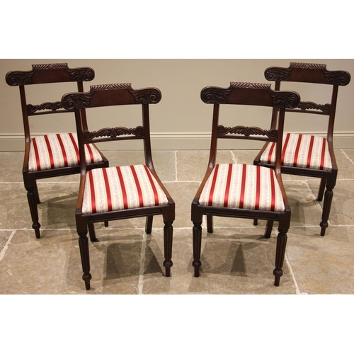 805 - A set of four William IV mahogany dining chairs, each with a leaf scrolled and gadrooned top rail ov... 