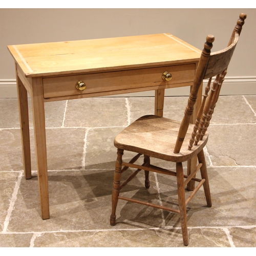 811 - A Victorian pine side table, the single frieze drawer with applied brass handles upon tapering legs ... 