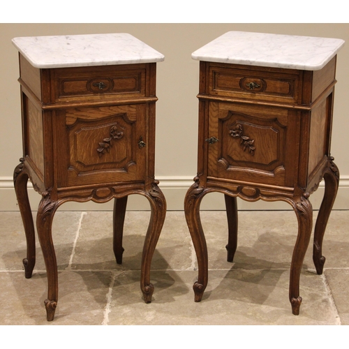 816 - A pair of Louis XV marble top oak bedside cabinets, late 19th/early 20th century, each with a square... 