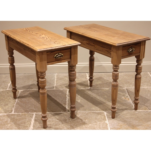 818 - A pair of Victorian style pitch pine side tables, the rectangular moulded tops over a pair of opposi... 