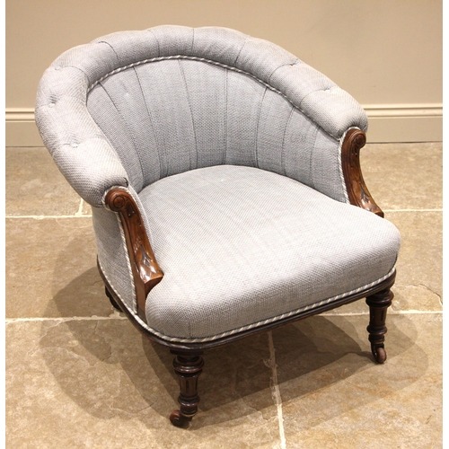 824 - An Edwardian walnut tub chair, later re-covered in blue fabric, the padded horse shoe shaped top rai... 