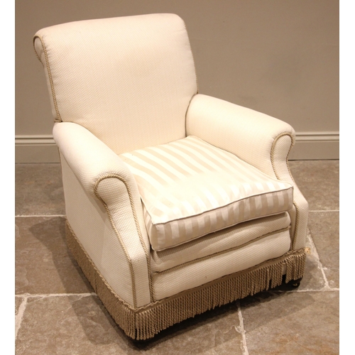 826 - An early 20th century club armchair, late re-covered in ivory coloured fabric and applied with cord ... 