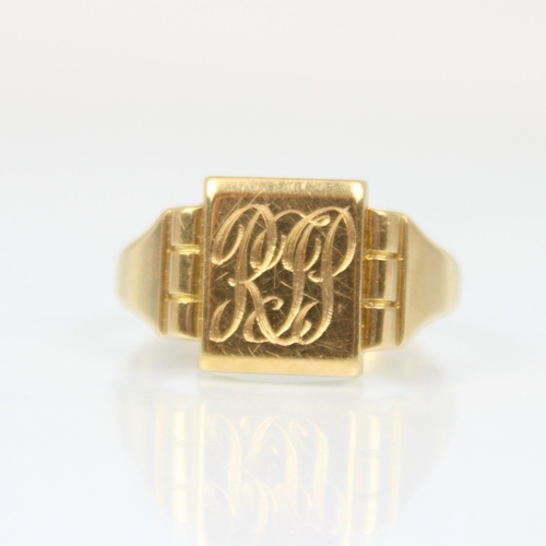 205 - An 18ct yellow gold signet ring, the rectangular shaped head with engraved monogram, leading to plai... 