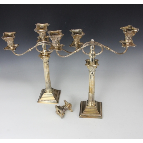 27 - A George V pair of silver candelabrum, Britton Gould and Co, Birmingham 1929, the triple branch abov... 