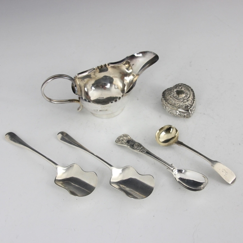 40 - A selection of silver, including an Edwardian silver sauce boat, The Alexander Clark Manufacturing C... 