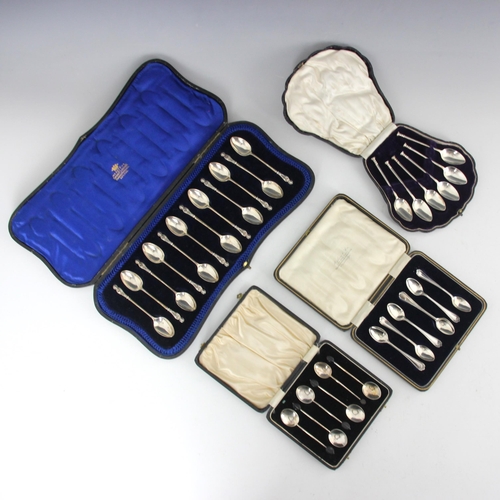 46 - A selection of cased flatware, including a cased set of twelve George V silver apostle style spoons,... 