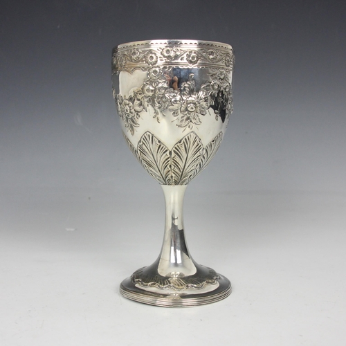 52 - A George III silver goblet, ‘RB’ Dublin 1791, the floral rim above an embossed garland and acanthus ... 