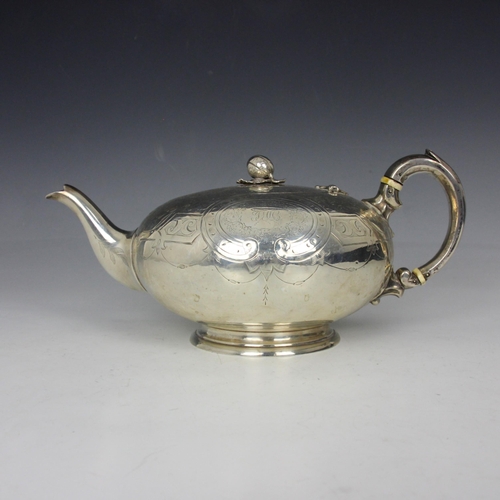 55 - A Victorian silver teapot, Joseph Angell II, London 1862, the cast fruit designed finial above bulbo... 