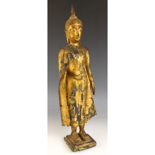 600 - A South-East Asian gilt bronze standing buddha, Siam (Thailand), Rattanakosin Period (18th century),... 