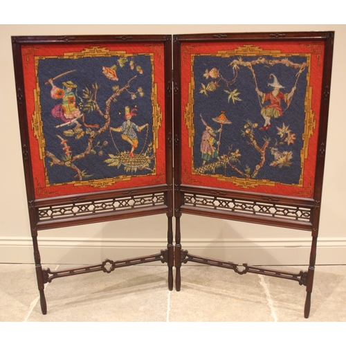 799 - A Chinese Chippendale style mahogany folding screen, 19th century, the twin screens enclosing needle... 