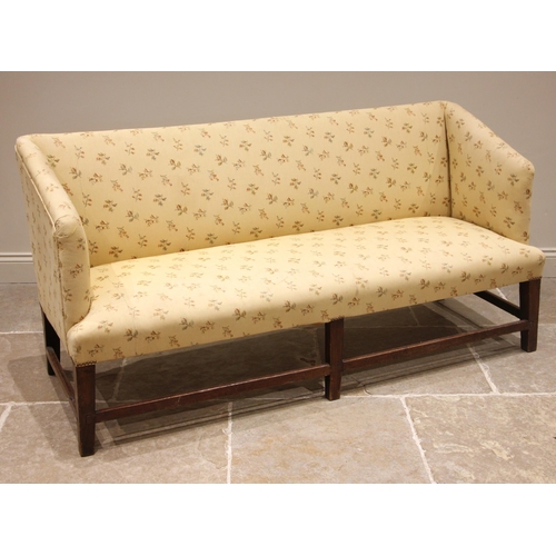 727 - A George III oak and upholstered sofa, later re-covered in cream coloured floral fabric, the straigh... 