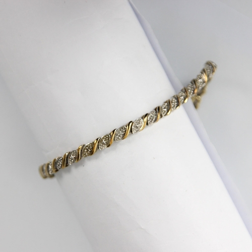 168 - A 9ct yellow and white gold bracelet, the shaped white gold panels with yellow gold spacers, with bo... 