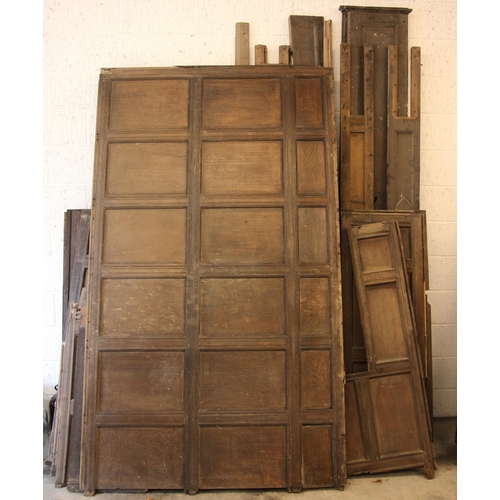 716 - A collection of 18th century and later oak panelling, the largest panel 239cm x 138cm, applied with ... 