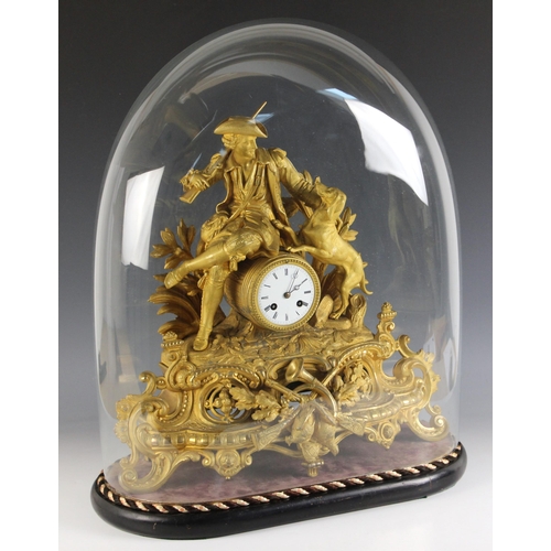 711 - A late 19th/early 20th century French gilt metal mantel clock, the 10cm white enamelled drum dial su... 