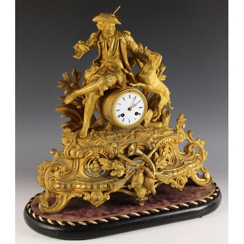 711 - A late 19th/early 20th century French gilt metal mantel clock, the 10cm white enamelled drum dial su... 