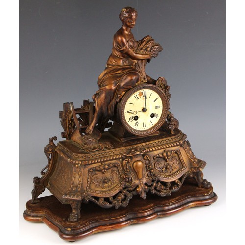 712 - A gilt spelter Louis XVI style mantel clock, late 19th century,  the 10cm enamelled drum dial surmou... 