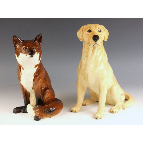 561 - A Beswick fireside fox, model number 2348, printed and impressed marks to base, 31.5cm high; with a ... 