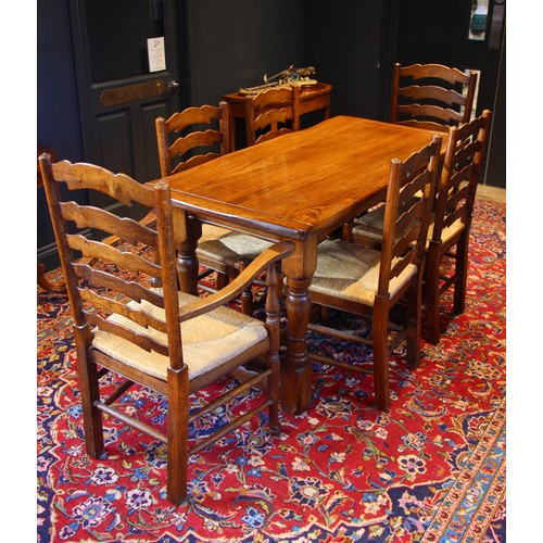 753 - A set of six 19th century style oak Lancashire ladder back kitchen chairs, late 20th century, each c... 