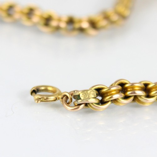 272 - A yellow metal choker style chain, of double trace link design, with applied ‘9c’ pad, bolt ring fas... 