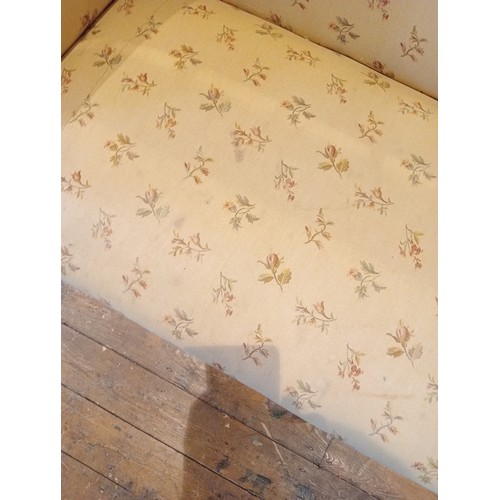 727 - A George III oak and upholstered sofa, later re-covered in cream coloured floral fabric, the straigh... 