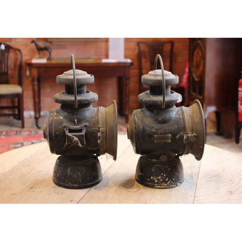 635 - A pair of vintage Lucas Ltd 'King of the road' oil powered motoring lamps, finished in black, 34cm h... 