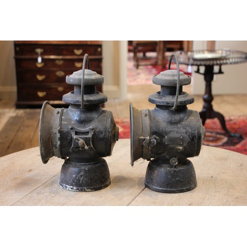 635 - A pair of vintage Lucas Ltd 'King of the road' oil powered motoring lamps, finished in black, 34cm h... 