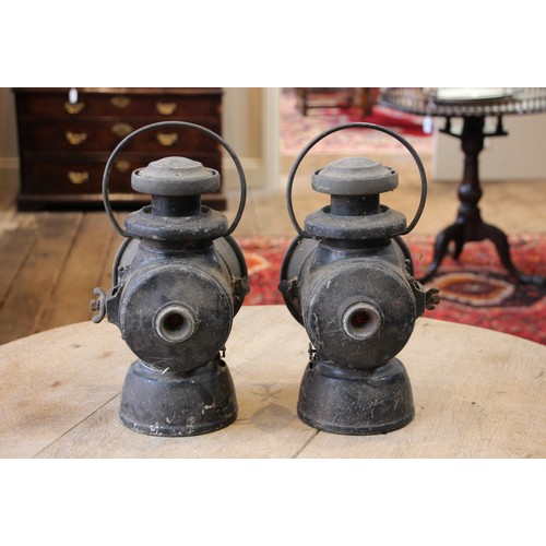 635 - A pair of vintage Lucas Ltd 'King of the road' oil powered motoring lamps, finished in black, 34cm h... 