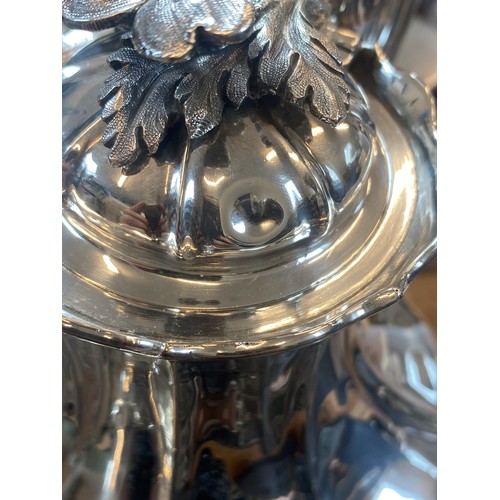 54 - A Victorian silver coffee pot, John and Henry Lias, London 1844, the cast flower head finial above l... 