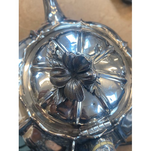 53 - A Victorian silver teapot, John and Henry Lias, London 1844, the cast flower head finial above lobed... 