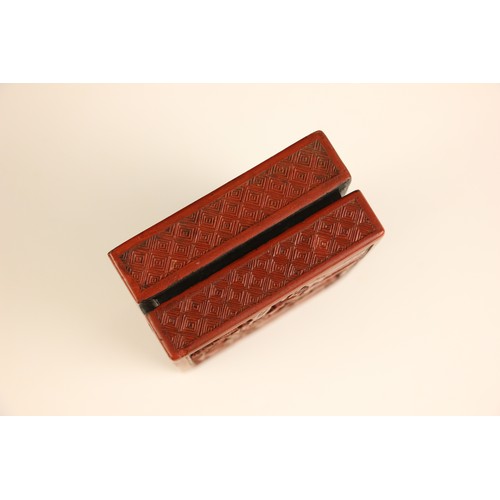 595 - A Chinese cinnabar lacquer box and cover, 19th/20th century, the rectangular box with removable cove... 