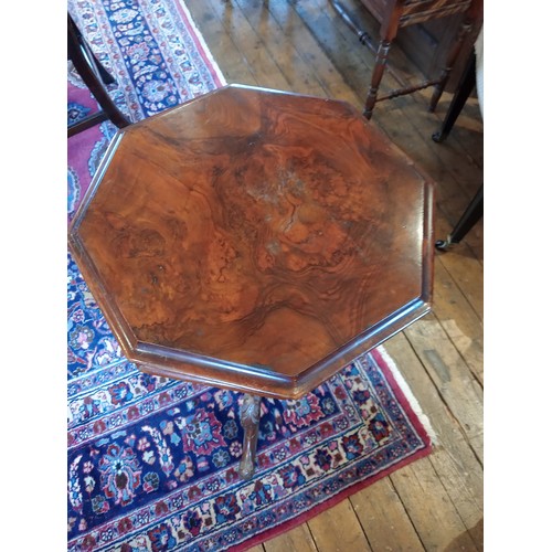 798 - A Victorian walnut and burr walnut sewing table, of tapering octagonal form, the burr cover opening ... 