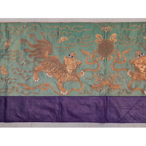 609 - A Chinese silk embroidered panel, early 20th century, the rectangular panel stitched with golden thr... 