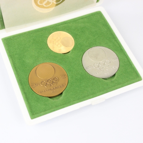 137 - Elizabeth II (1952-2022) Tokyo 1964 ‘In commemoration of the games of the XVIII Olympiad’ cased set ... 