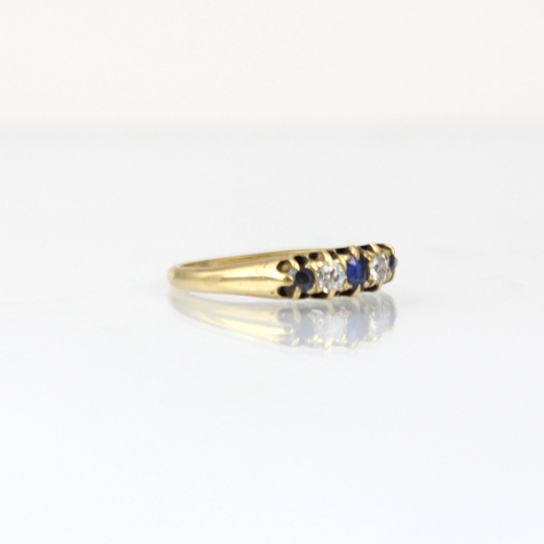 179 - A 19th century diamond and untested sapphire ring, the three graduated cushion cut stones with old c... 