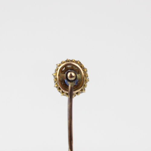 199 - A 19th century diamond and untested sapphire stick pin, the central cushion cut sapphire within surr... 