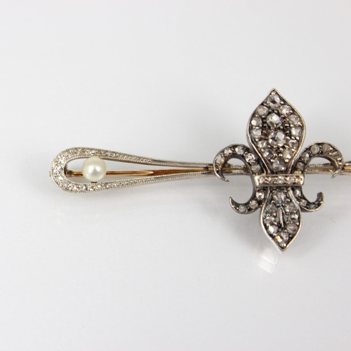 235 - A late 19th century diamond brooch, the central fleur de lis designed motif set with rose cut diamon... 