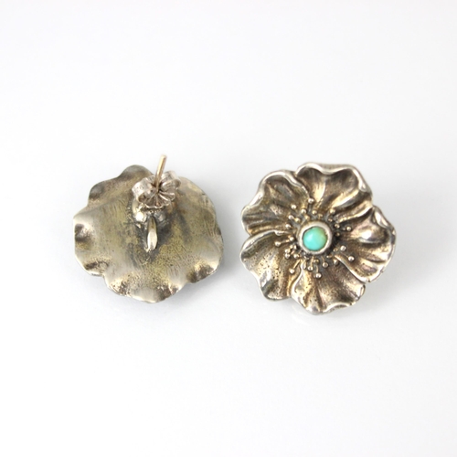 237 - A pair of early 20th century earrings, the Art Nouveau designed floral earrings with central turquoi... 