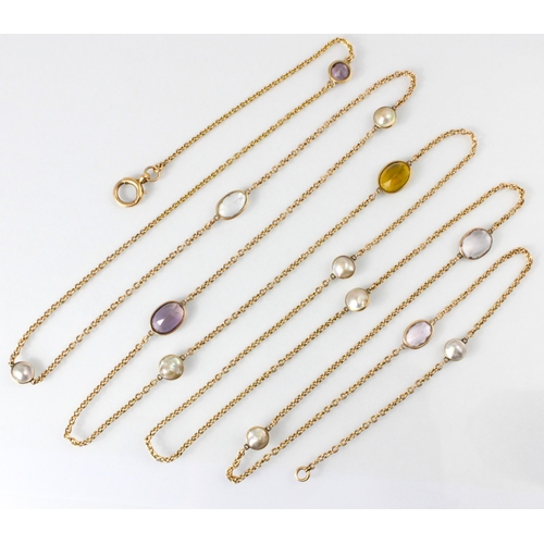 273 - A 20th century spectacle set blister pearl and gemstone set long guard chain, the trace link yellow ... 