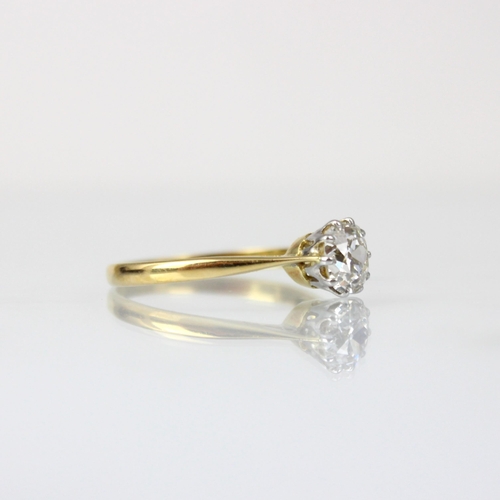 293 - An Edwardian diamond solitaire, the old cut diamond within a yellow metal claw setting, leading to t... 