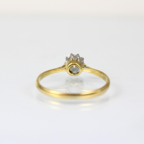 293 - An Edwardian diamond solitaire, the old cut diamond within a yellow metal claw setting, leading to t... 