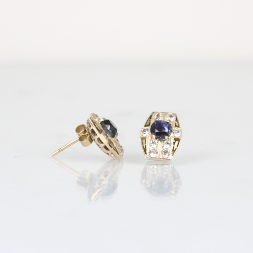 303 - A pair of Art Deco style untested sapphire earrings, the central round cut untested sapphire within ... 